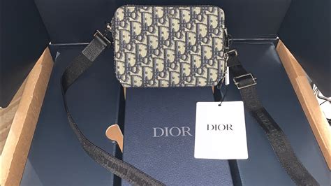 dior pearl cross body|Dior pouch with shoulder strap.